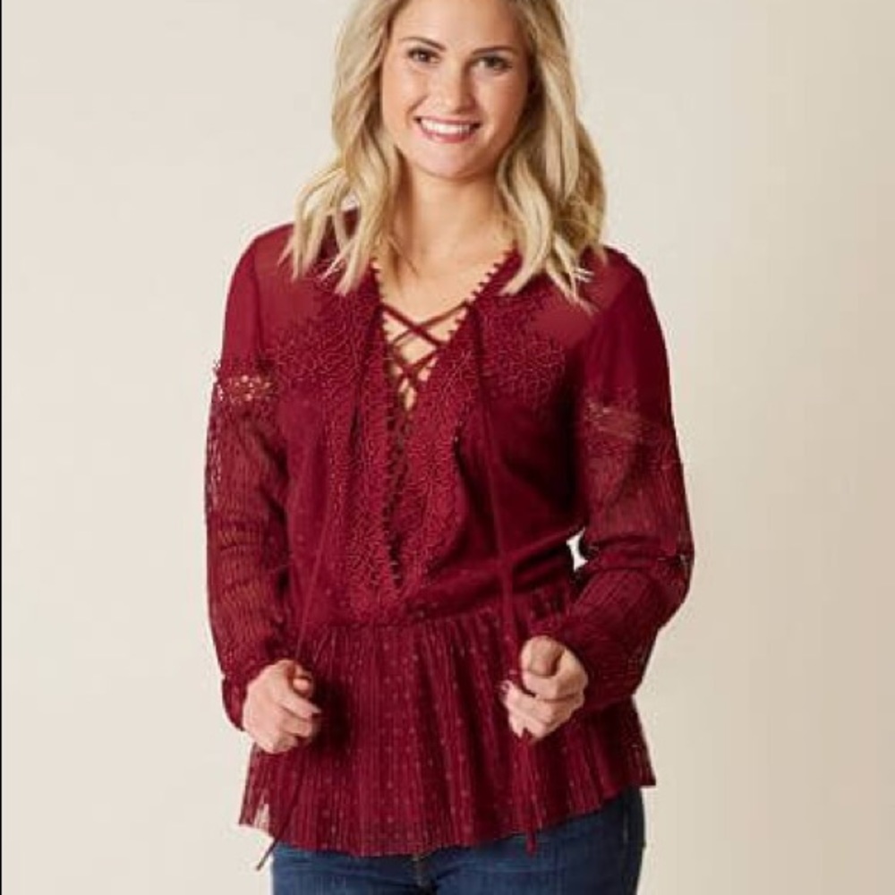 NWT Peplum lace up top